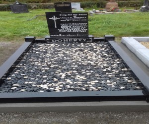 Old black headstone with new base,  kerbs 4 posts